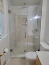Enhance Your Bathroom Space with a Glass Shower Door