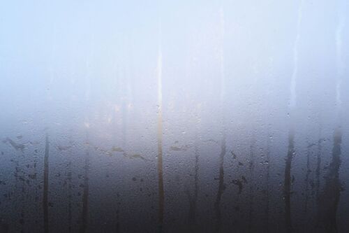 Close-up photo of a foggy window.