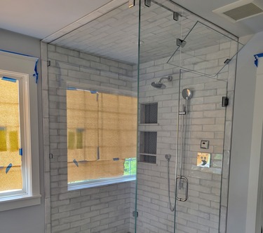 Steam Shower Ann Arbor with mulit colored tile floor